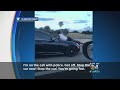 Police Release 911 Call On Man Riding Hood Of Car