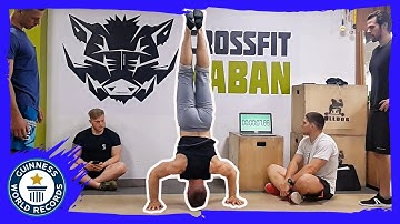 Most handstand push ups in one minute - Guinness World Records