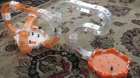 Kid playing with Hexbug Nano Bug Infinity Loop