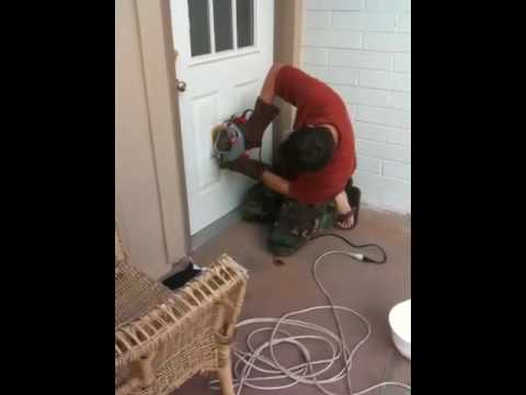 Cutting a hole in a steel door. - YouTube