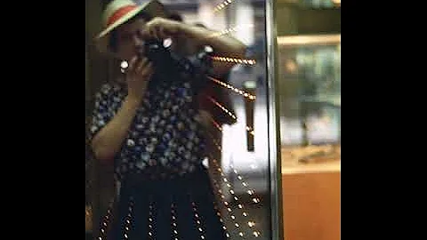 Vivian Maier taking a walk on the wild side in Chicago with an 8mm movie camera...circa 1970.