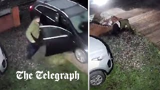 video: Driver dragged into brick wall by thief stealing his car