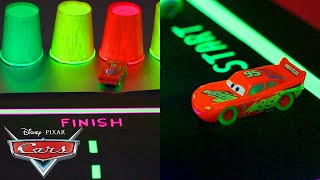 What Makes a Racetrack Glow in the Dark? | Science of Glowing | Pixar Cars