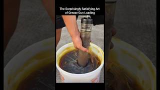 The Surprisingly Satisfying Art of Grease Gun Loading.