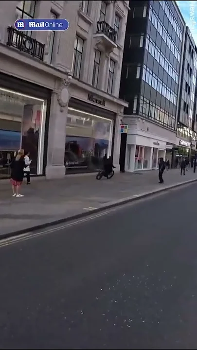 Shocking moment woman has her phone snatched at Oxford Circus in London
