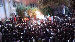 Senegalese celebrate outside Ousmane Sonko's home following his release | AFP image