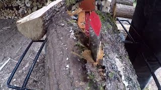 #206 BRAVE Dual Split wood splitter. Splitting and stacking firewood on a rainy day. outdoor channel