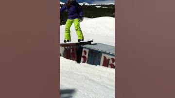 14 year old girl snowboarder hitting a box