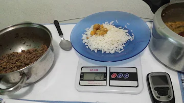 Quanto é 50g de arroz cozido?