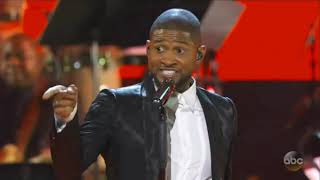 Usher  James brown medley assisté par l'ex président Barack Obama