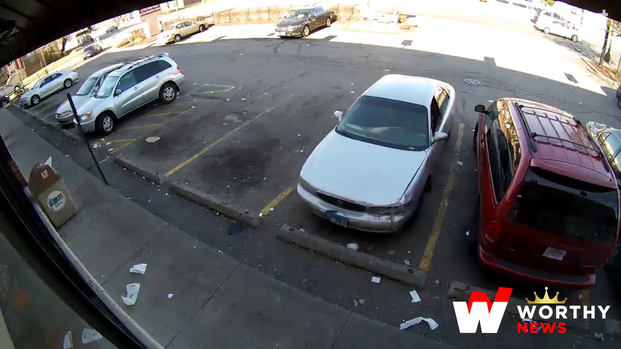 WATCH A shootout in a Chicago parking lot is caught on surveillance