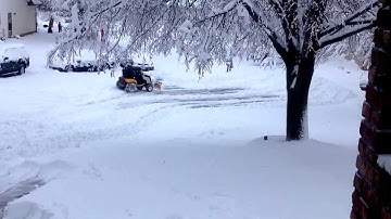 2011 Cub Cadet GT2100 plowing 10" of snow.