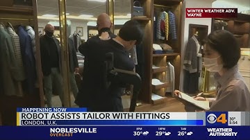 Robot assists tailor with fittings