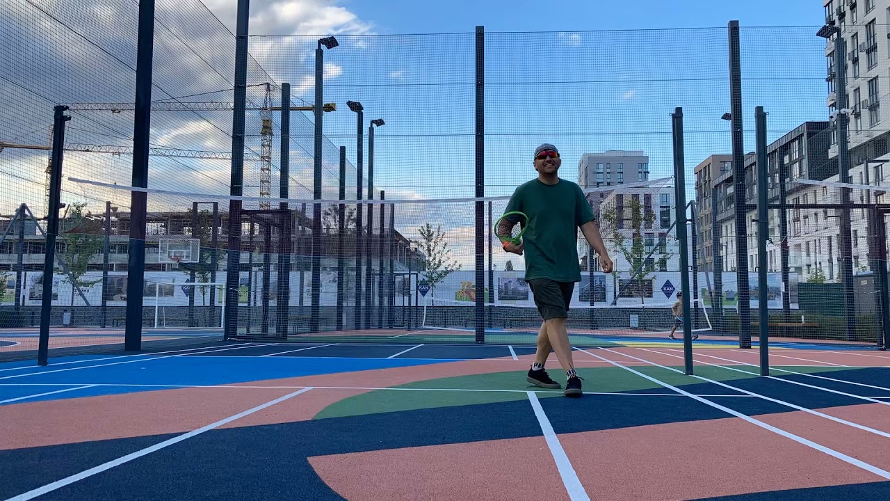 Motion lapse - playing tennis badminton / funnyten at Fayna town resodence complex