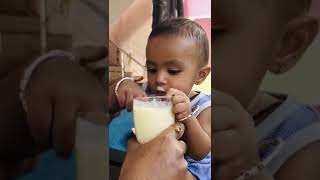 Cute baby drinking mango Shake 😋