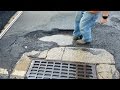 Oblivious Drivers Hit Massive Pothole