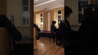 playing la valse d'amélie by yann tiersen on a public event (piano)