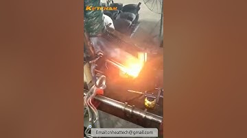 Bolt induction forging furnace with automatic feeding system