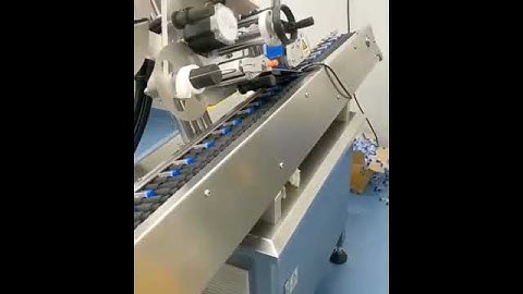 Tube filling capping labeling machine for reagent