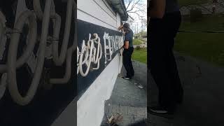 taking down a 1925 funeral home sign