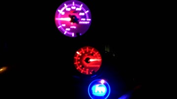 GlowShift Gauges at night in 2009 Dodge Challenger SRT8