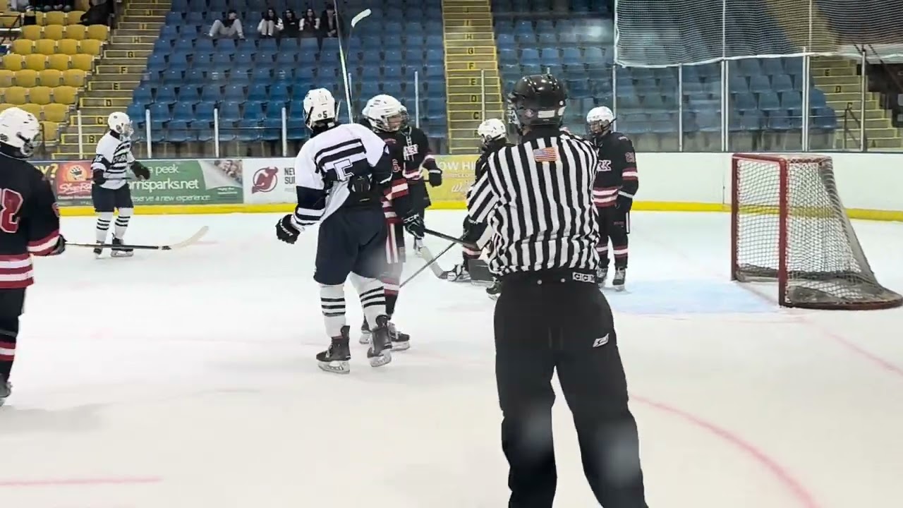 Roman Kostrowski puts away the pass from behind the net from Kieran Brendle