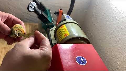 [4] Copying a key with that super cheap key copying machine on amazon.