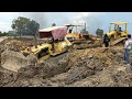 Heavy Komatsu Bulldozer Stuck in Deep Mud and Extreme Recovery by two Bulldozers Komatsu