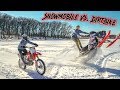 Dirtbike vs. Snowmobile on ICE!!!