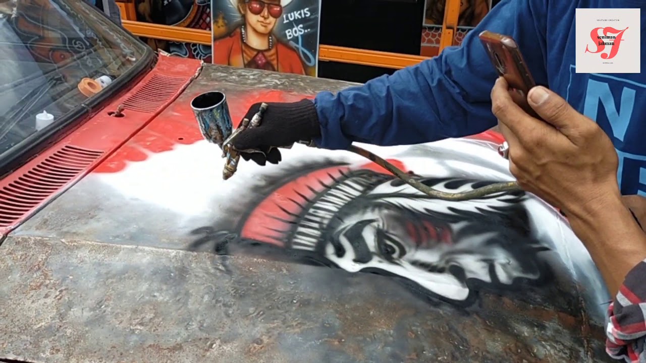 Corat coret mobil karatan