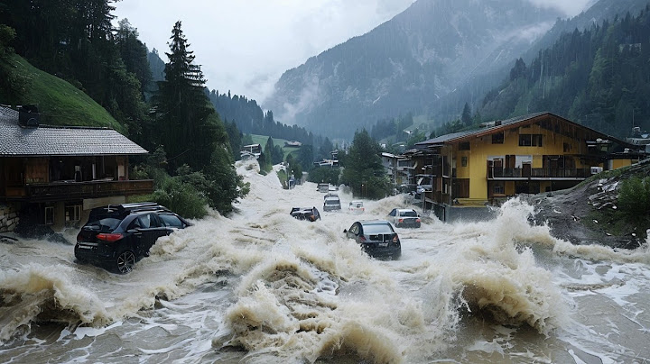 Torrential rainfall brings massive flood and landslides to St. Anton am Arlberg in Tyrol, Austria!