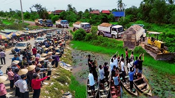 New Landfill Up Into Rice Field A New Project By Skill Bulldozer Pushing Soil &Dump Truck Unloading