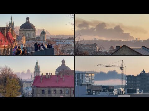 Smoke rises above