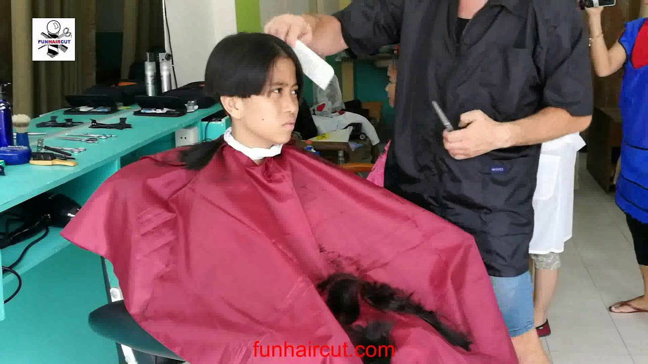 Young girl barbershop boy cut