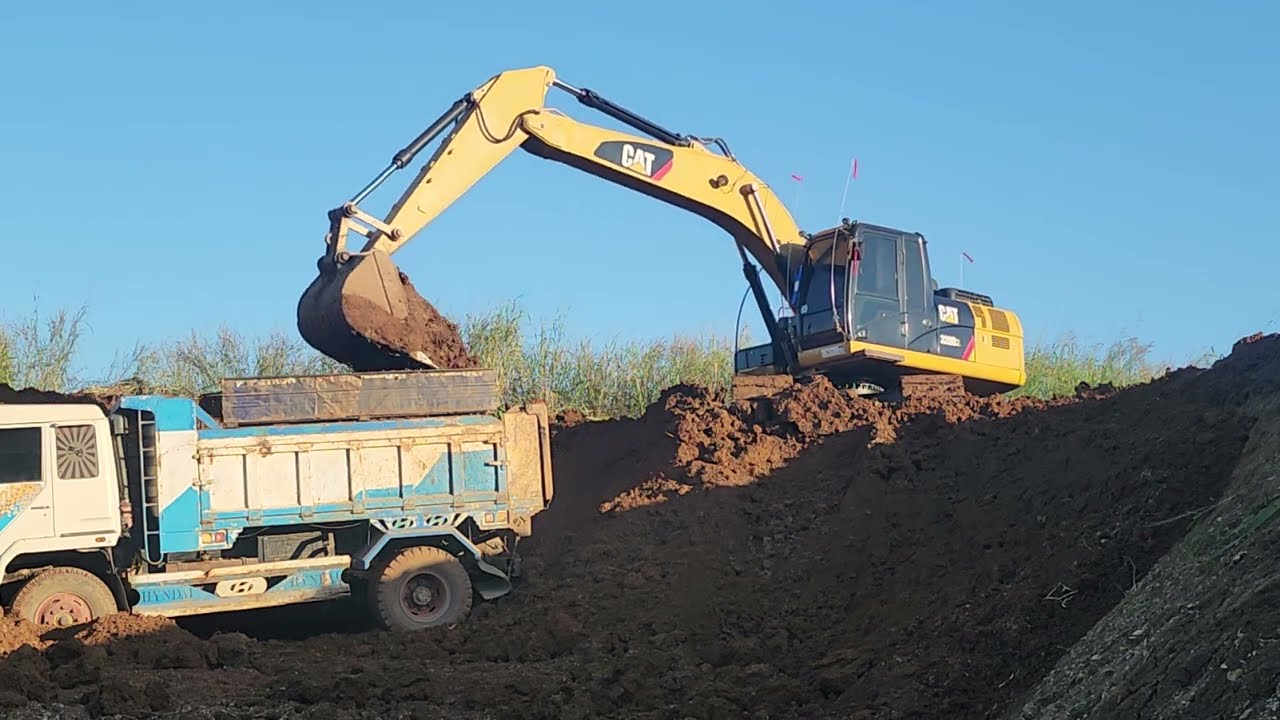 Powerful CAT Excavator Loading Dump Trucks | Construction Site 