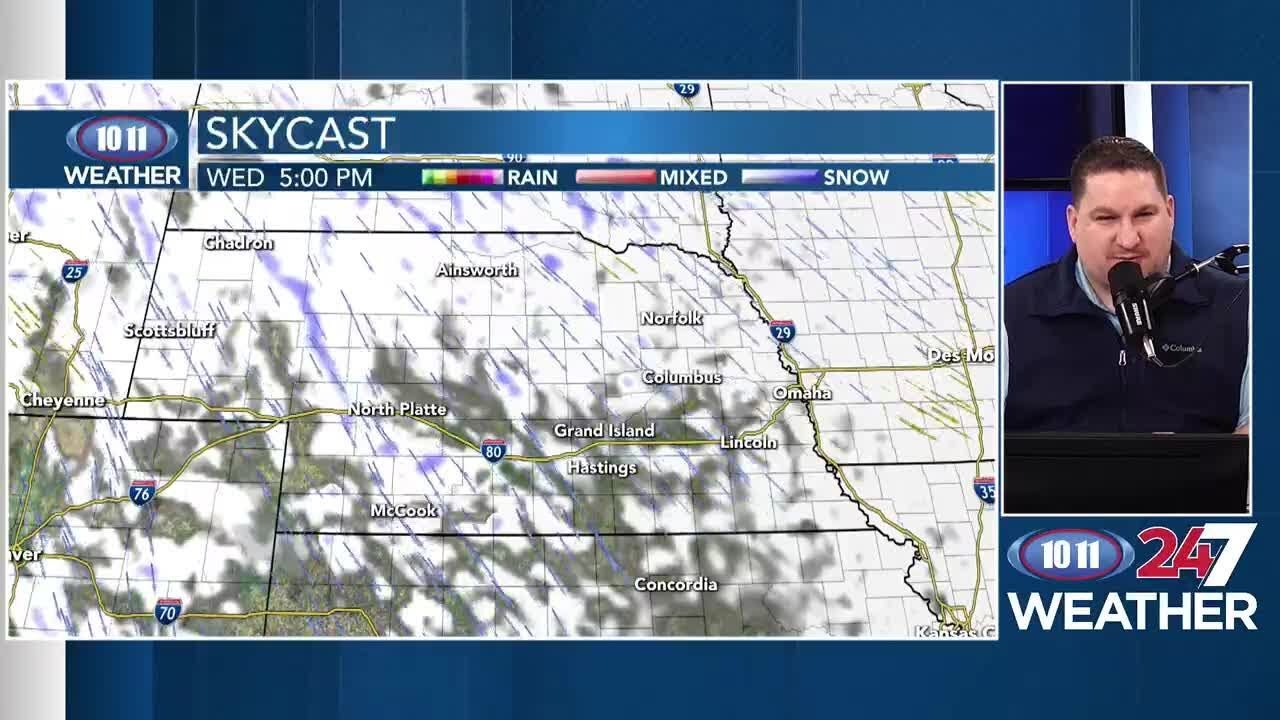 Milder weather returns; scattered light rain or snow showers possible ...