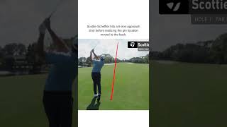 Scottie Scheffler hits a 6-iron approach shot before realizing the pin location moved to the back.
