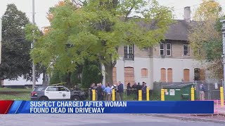 Suspect charged after woman found dead in driveway