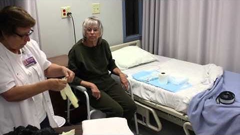 Assisting a resident to use a portable commode or toilet