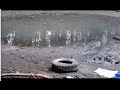 Pulling a tire out of the shoreline at Roxboro Island PART 2