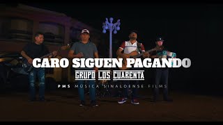 Grupo Los Cuarenta - Caro siguen pagando
