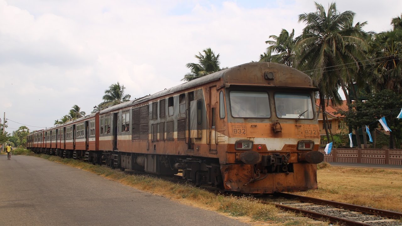 Sri Lanka Railways Colombo railcar S8 832 and commuter train 3817 pass ...