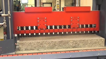 Automatic splitting plant for the production of granite palisades of 2 meters.MEC