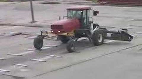 MacDon M150 SP Windrower Tractor on test track