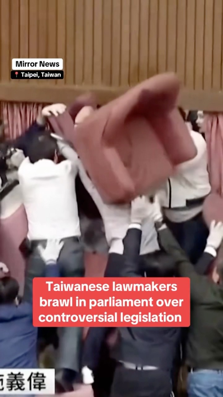 Taiwanese lawmakers brawl in parliament over controversial legislation #shorts