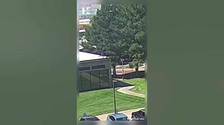 Newly released CCTV footage shows suspect climbing down off roof after Charlie Kirk shooting