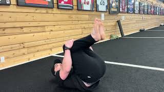Rolling Spinal Flexion