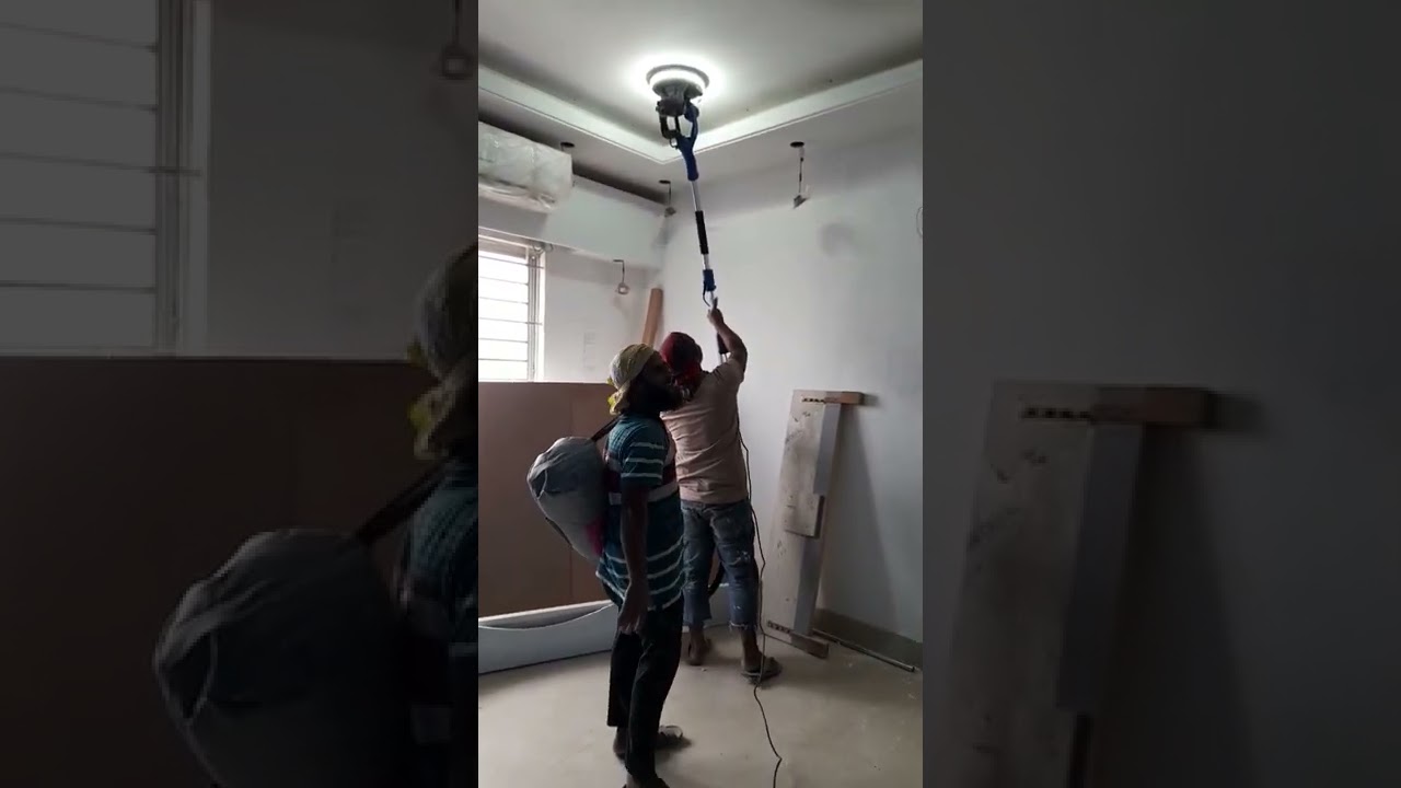 working with a long handle Sander machine