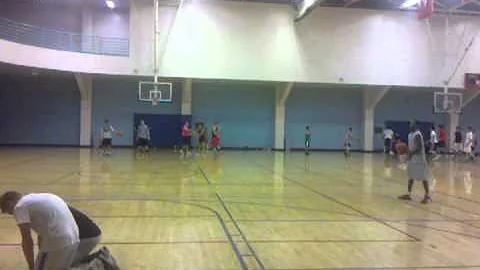 Chris Kiros jumps over 2 people
