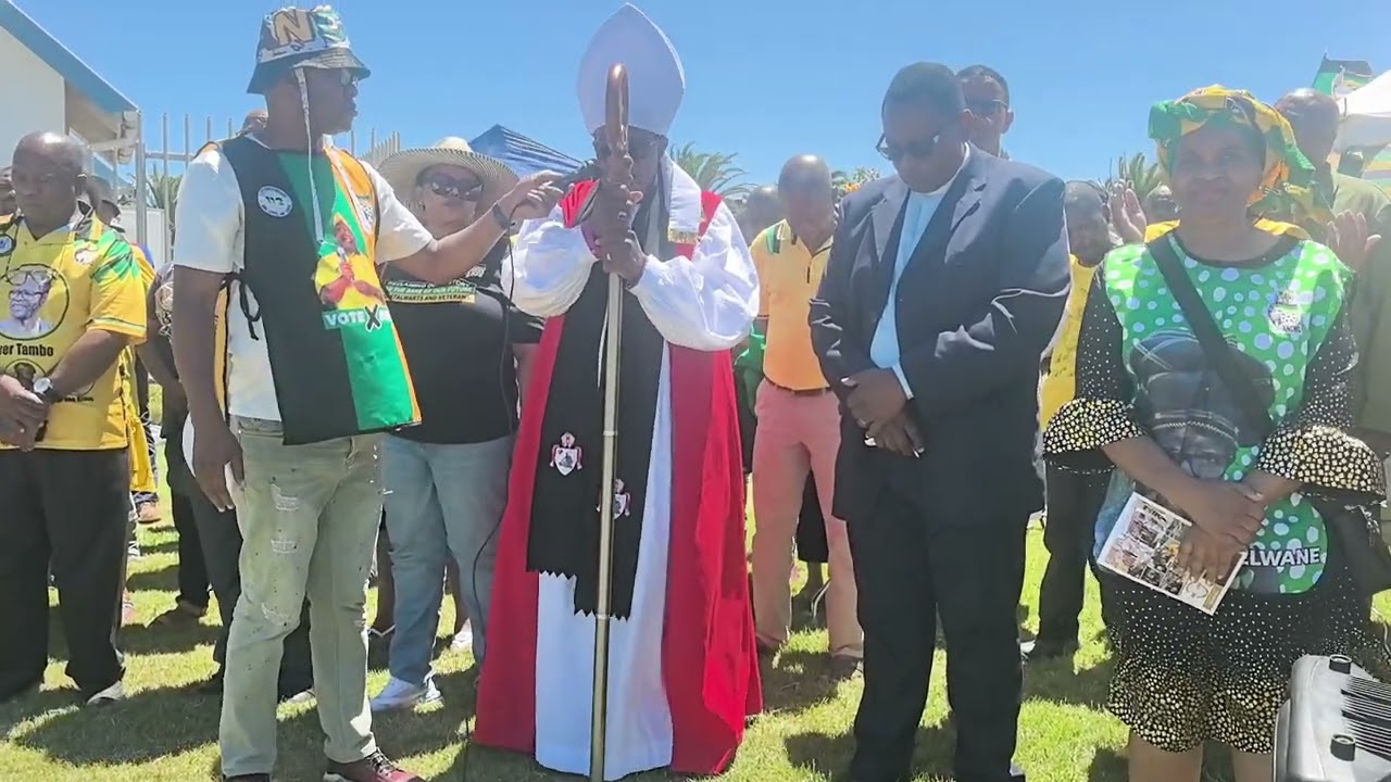 Bishop Themba Mahuwa, Blesses and Kissing the Ground at Bluewater Bay